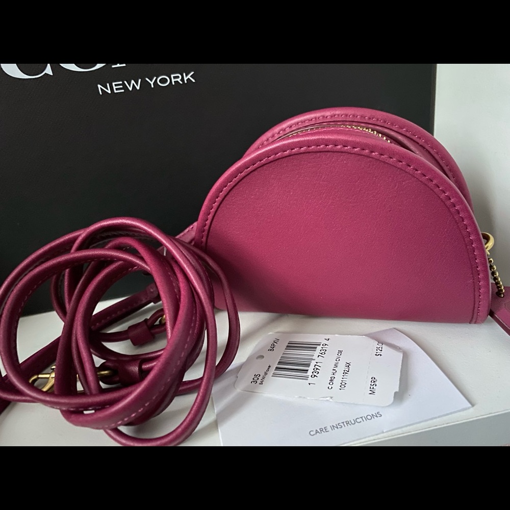 Limited edition half moon coin case